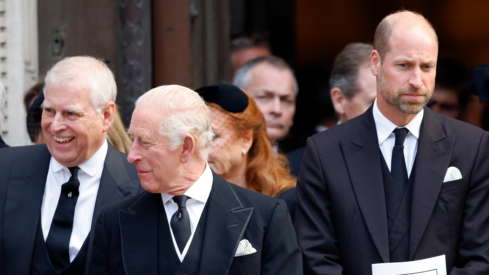 Prince Andrew laughs with King Charles, as Prince William looks awkward