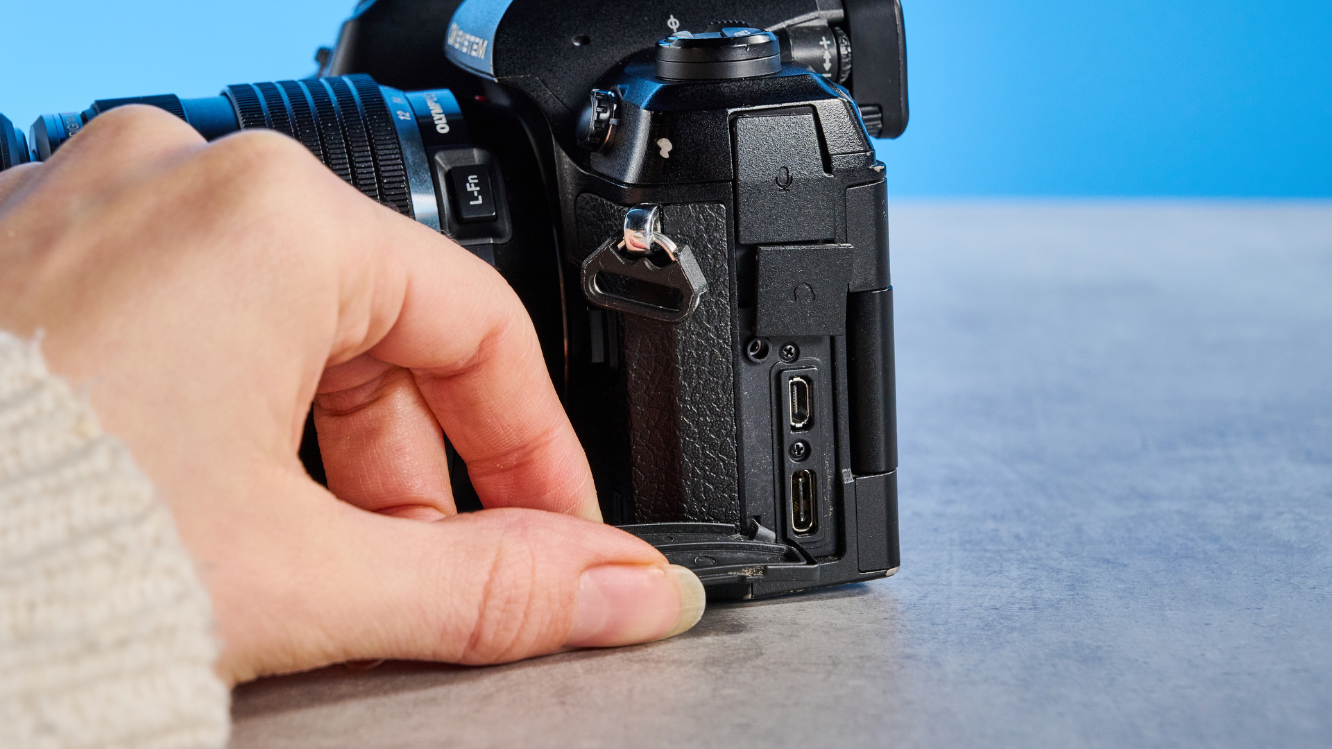 A black OM System OM-1 Mark II Micro Four Thirds mirrorless camera