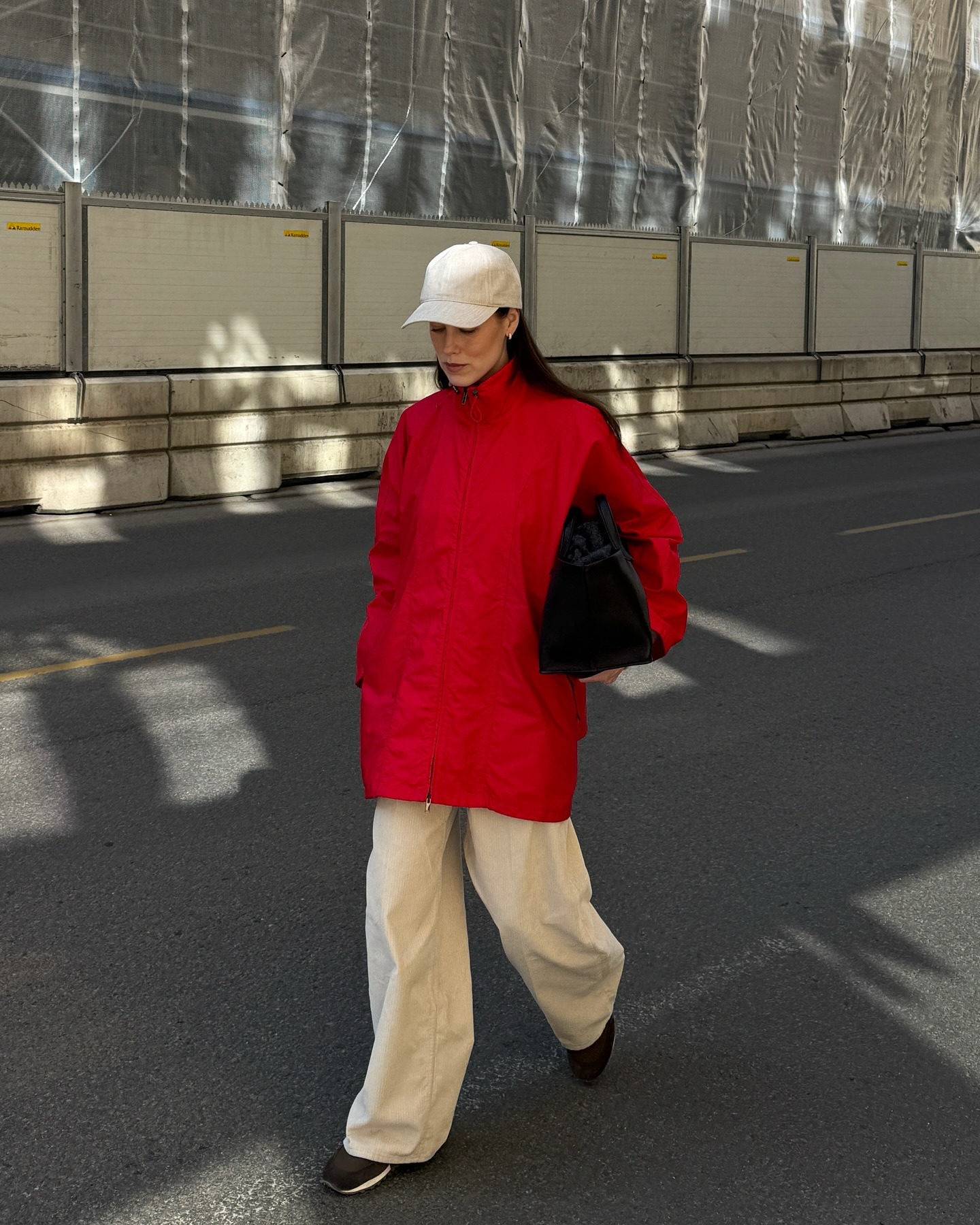 Influencer wearing sneakers with baggy khaki pants