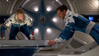 Johnny and Reed floating in the Excelsior spaceship in The Fantastic Four: First Steps