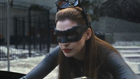Anne Hathaway on motorcycle and in costume on the set of The Dark Knight Rises (2012). 