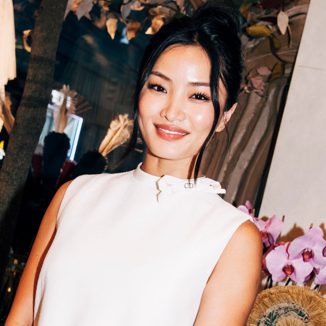 Anna Sawai attended a Dior event at NYFW in a little white dress and a Lady Dior handbag