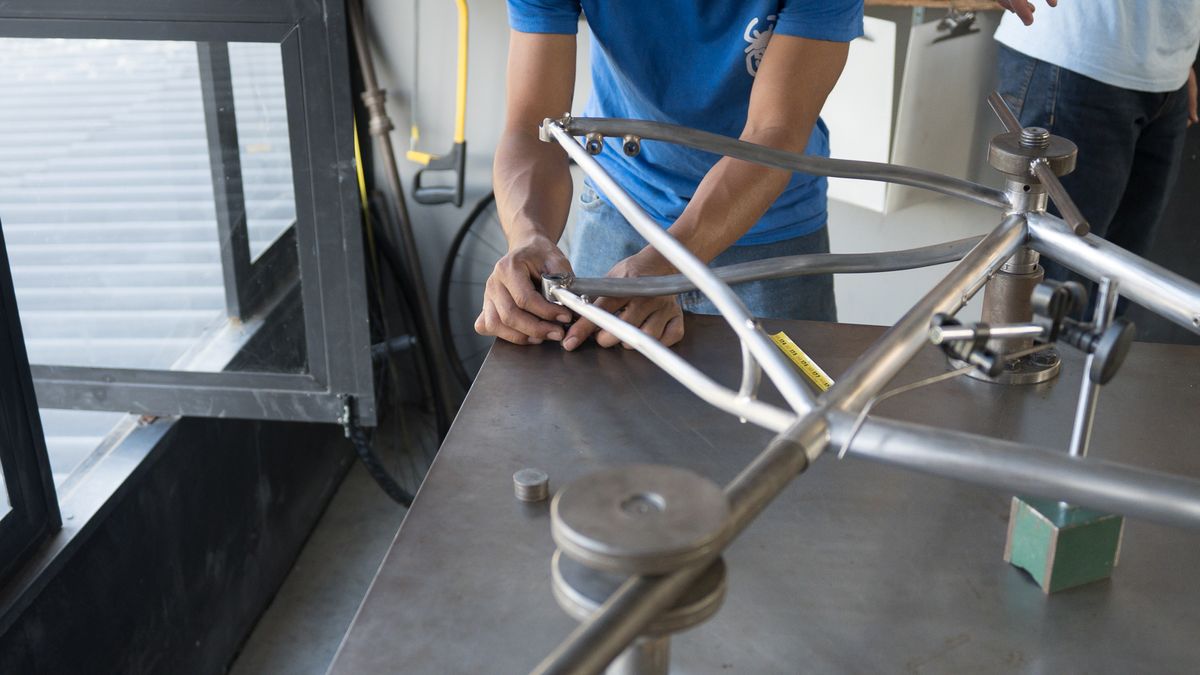checking a custom bike against a jig