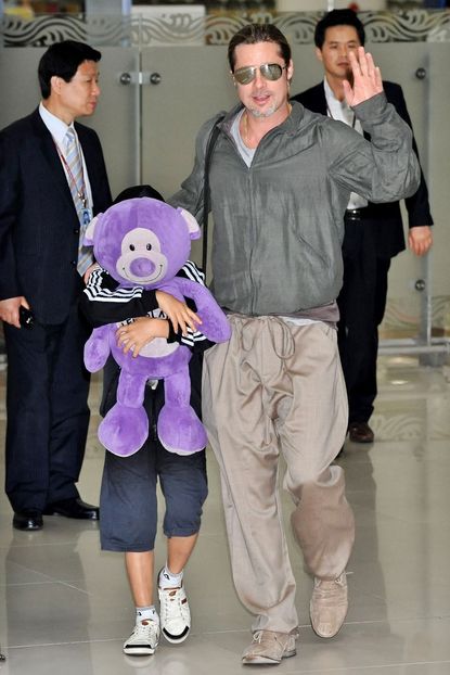 Brad Pitt and son Pax at Gimpo Airport in Seoul
