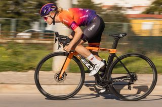 Image shows Human Powered Health team rider aboard a Felt race bike