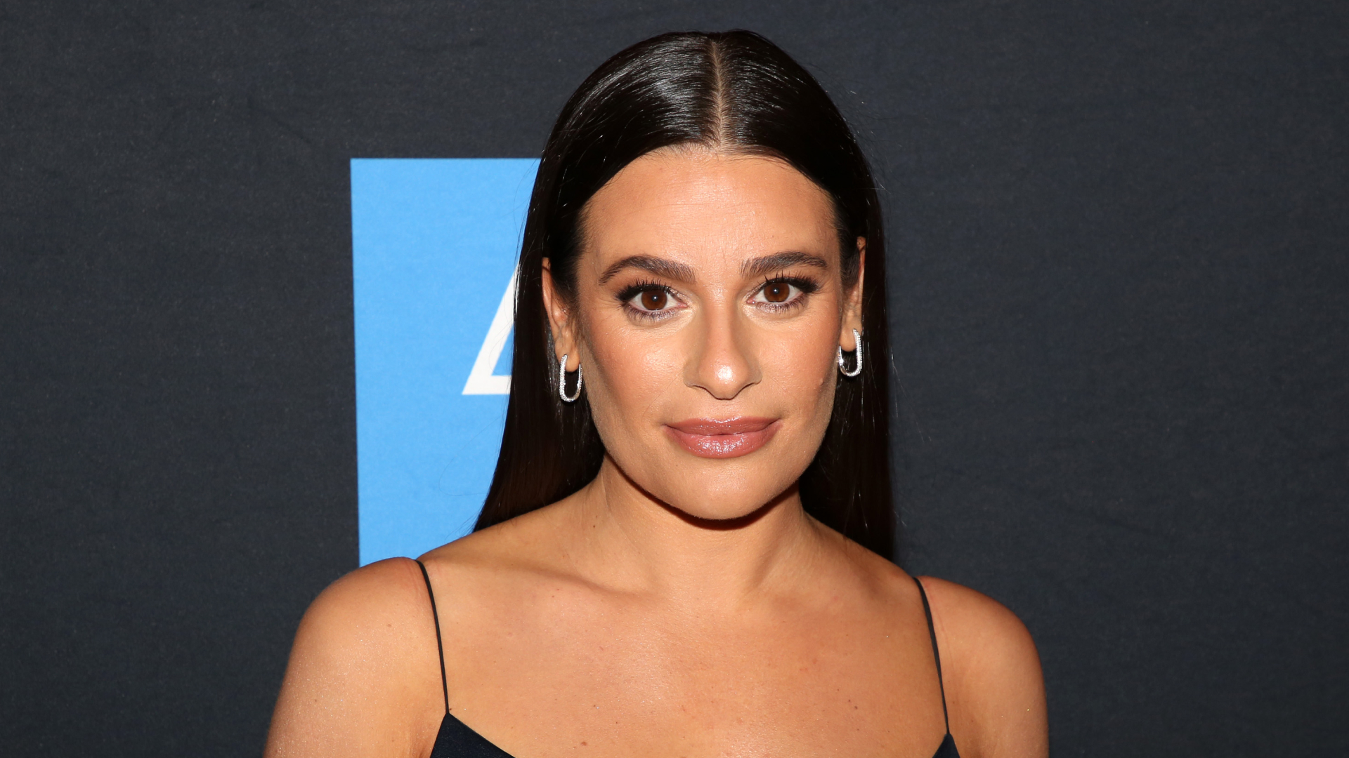 Lea Michele in a black sleeveless dress at the opening night of the new revival of the musical "Gypsy" on Broadway at The Majestic Theatre on December 19, 2024 in New York City