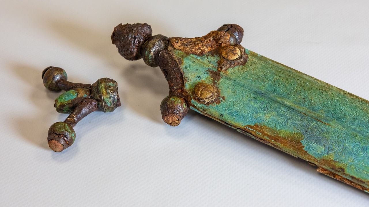 a close-up of a decorated sword