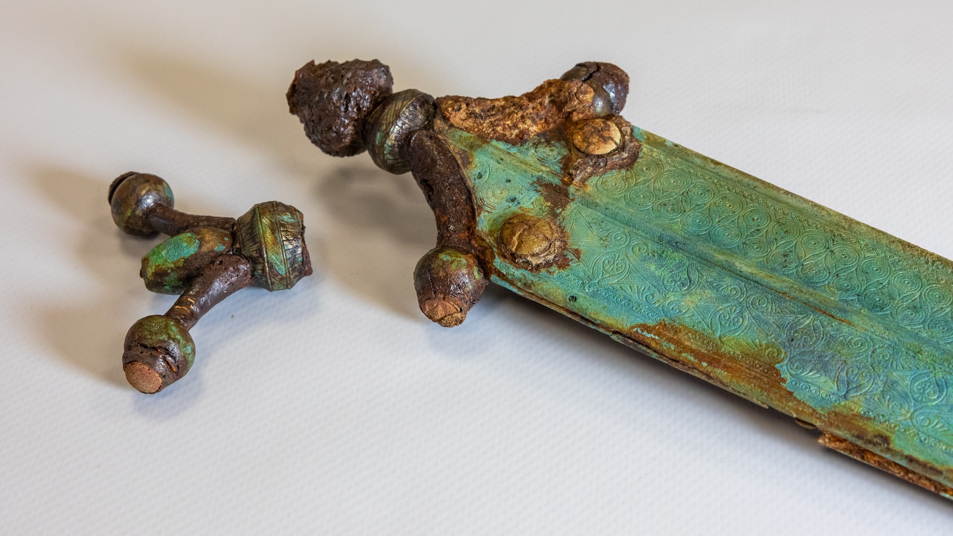 a close-up of a decorated sword