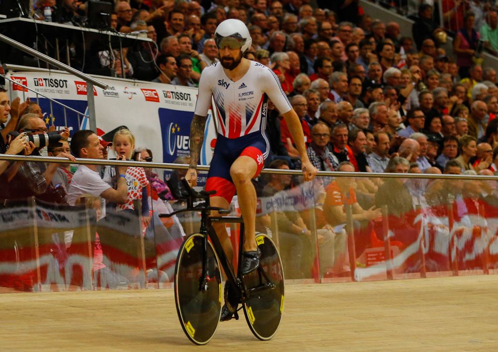 Bradley Wiggins eases up after the men's team pursuit final.
