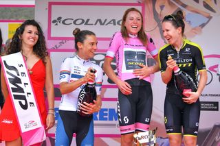 A jubilant Annemiek van Vleuten claims the maglia rosa in 2018, with Ashleigh Moolman Pasio second and Amanda Spratt third