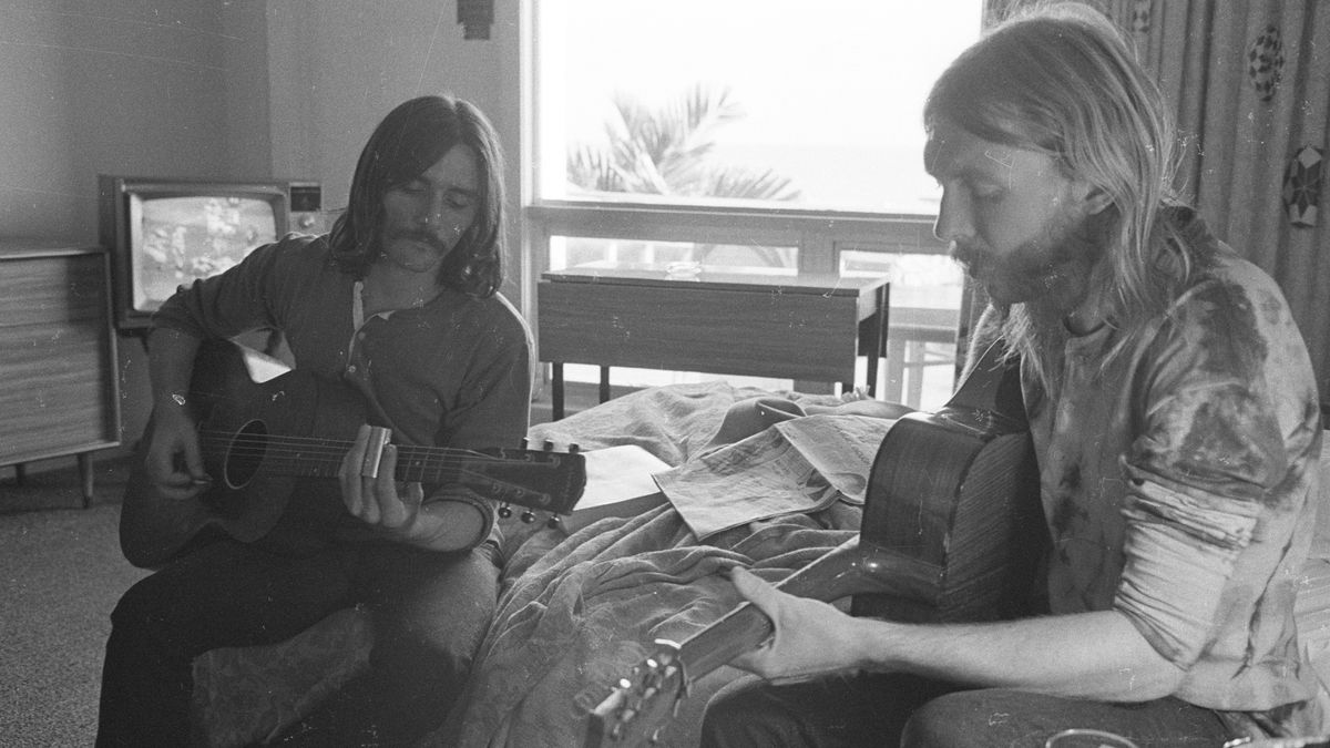 Dickey Betts (left) and Duane Allman play acoustic guitars in a hotel room before the Allman Brothers Band&#039;s performance at the Sitar in Spartanburg, South Carolina on October 17, 1970