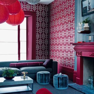 living room with deep crimson wallpaper