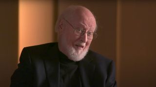 John Williams smiles in conversation during his Classic FM interview.