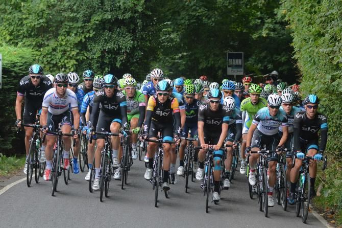 Bradley Wiggins and Team Sky at the head of affairs on the first climb of the day