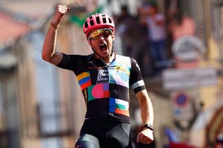 Team EF Education rider Italys Alberto Bettiol celebrates as he crosses the finish line to win the 18th stage of the Giro dItalia 2021 cycling race 231km between Rovereto and Stradella on May 27 2021 Photo by Luca Bettini AFP Photo by LUCA BETTINIAFP via Getty Images