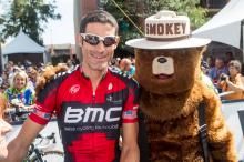 Smokey the Bear pays his respects to George Hincapie in Golden, Colorado prior to the BMC American's last road race in the professional peloton.