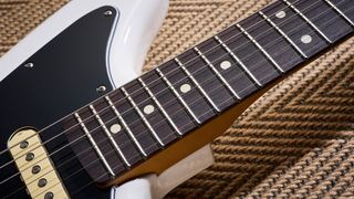 Close up of the rosewood fretboard on the Fender Player II Jaguar