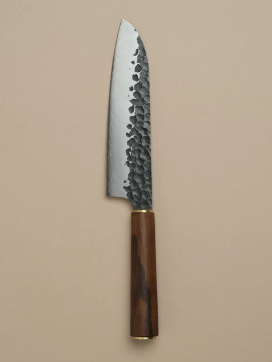A santoku knife from Katto with a dark walnut handle