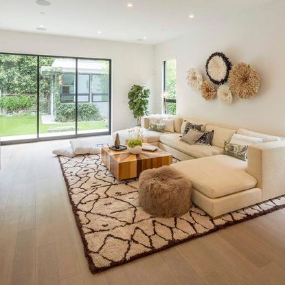 living room with cream wall and french windows