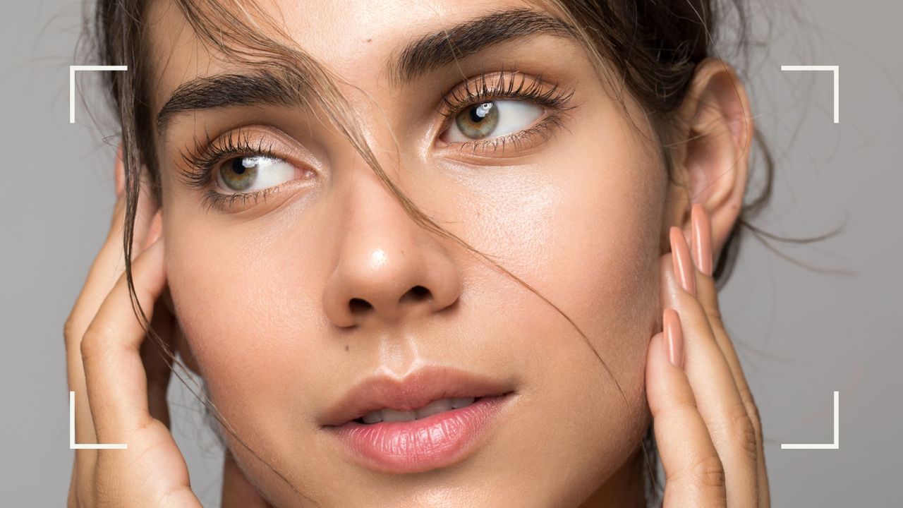 A close-in shot of a woman with defined, brushed up eyebrows, to show how you can do an at home eyebrow tint