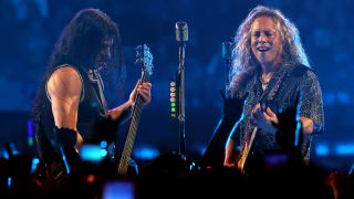 Kirk Hammett and Robert trujillo of Metallica onstage in 2023