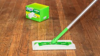 Swiffer sweeper on wooden floor