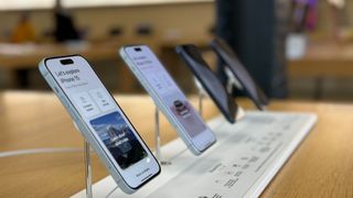 iPhone 15 on display in an Apple store