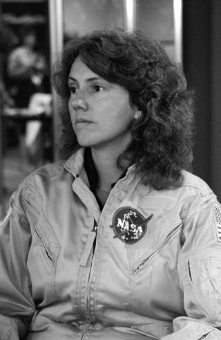 The portrait on the obverse of the 2021 Christa McAuliffe Silver Dollar commemorative coin was based on this photograph, showing McAuliffe in training for her space shuttle mission in 1985.