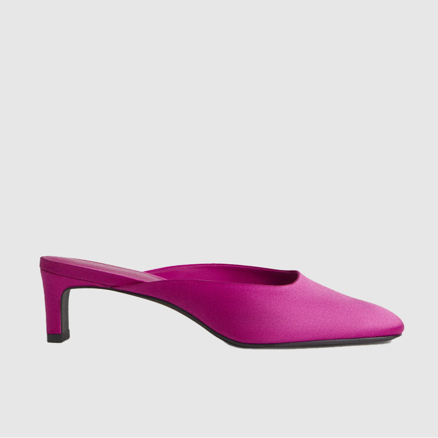 Fuchsia heeled mules.