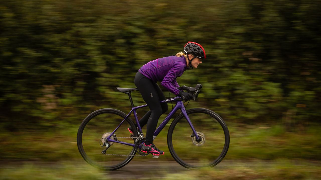 Female cyclist riding one of the best women&#039;s road bikes