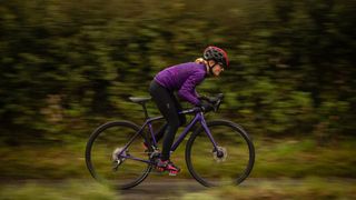 Female cyclist riding one of the best women's road bikes