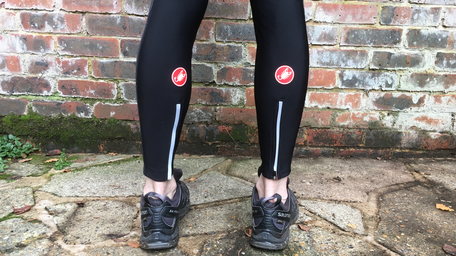 Image shows a rider wearing the Castelli Entrata Wind Bib Tights.