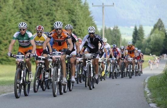 The jersey wearers roll out at the front of the pack.