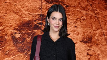 kendall jenner on an orange background