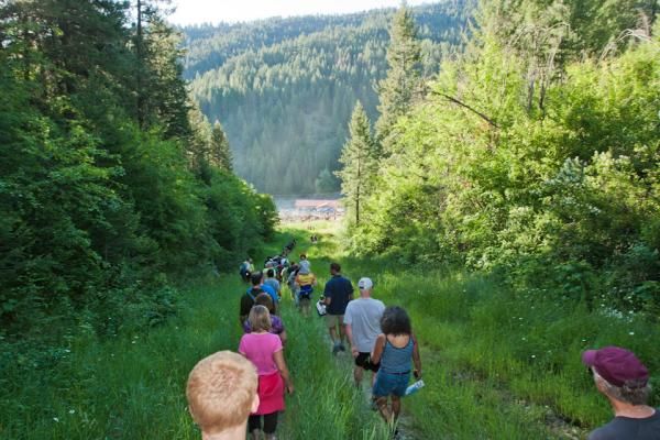 A huge Missoula XC crowd streams down to get to the finish (and the beer).