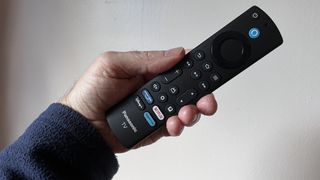 Panasonic Z95A remote control held in hand