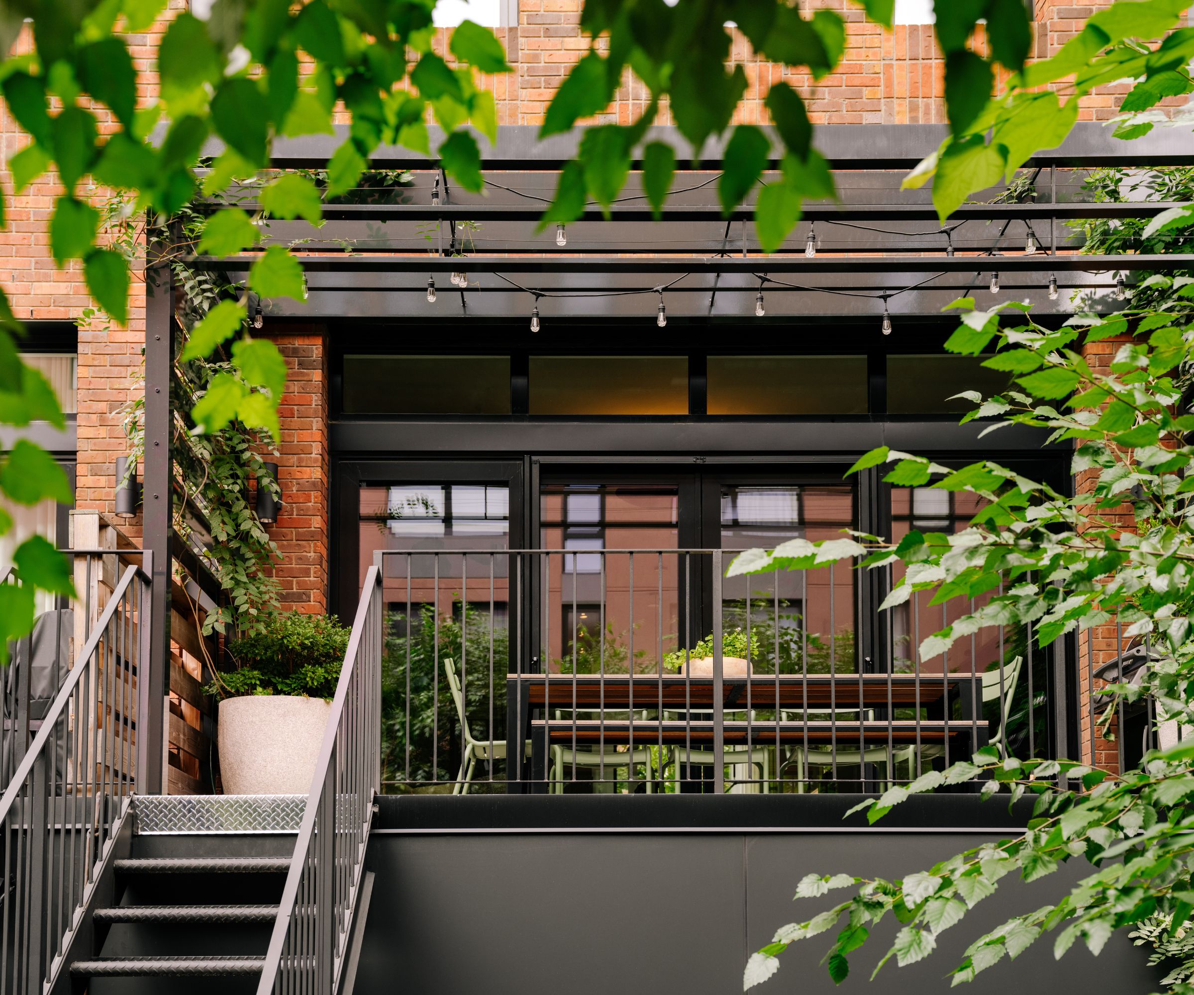 balcony dining space steps to garden