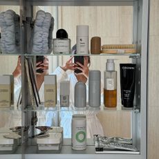 A medicine cabinet full of beauty products