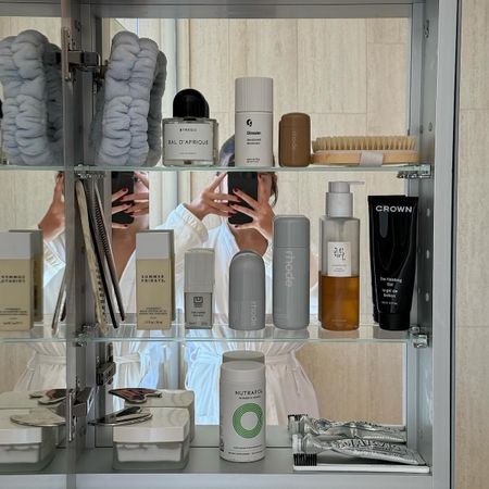 A medicine cabinet full of beauty products