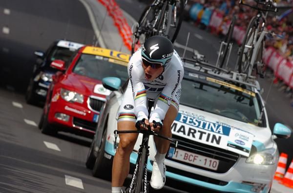 Tony Martin (Omega Pharma-QuickStep) had to switch bikes following a flat time and conceded 23 seconds to prologue winner Cancellara.