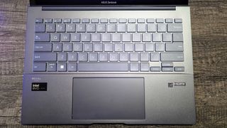 Image of the ASUS Zenbook 14 (Q415M) Windows laptop.