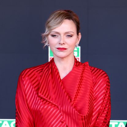 Princess Charlene of Monaco attends the Grand Prix wearing three very different outfits