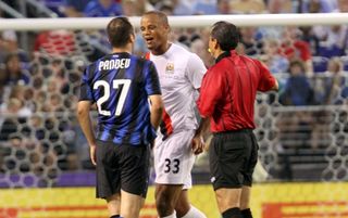 Pre Season Friendly, Inter Milan v Manchester City, Baltimore, Goran Pandev and Vincent Kompany square up to eachother (Photo by Sharon Latham/Manchester City FC via Getty Images)