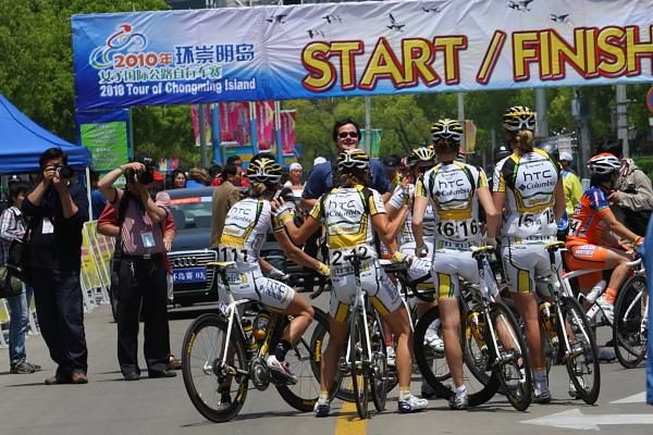 Celebrations for the HTC - Columbia Women riders as Directeur Sportif, Ronny Lauke tells them the photofinish decision
