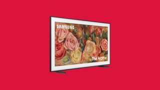 An angled shot of the Frame TV, on a kind of pink background.