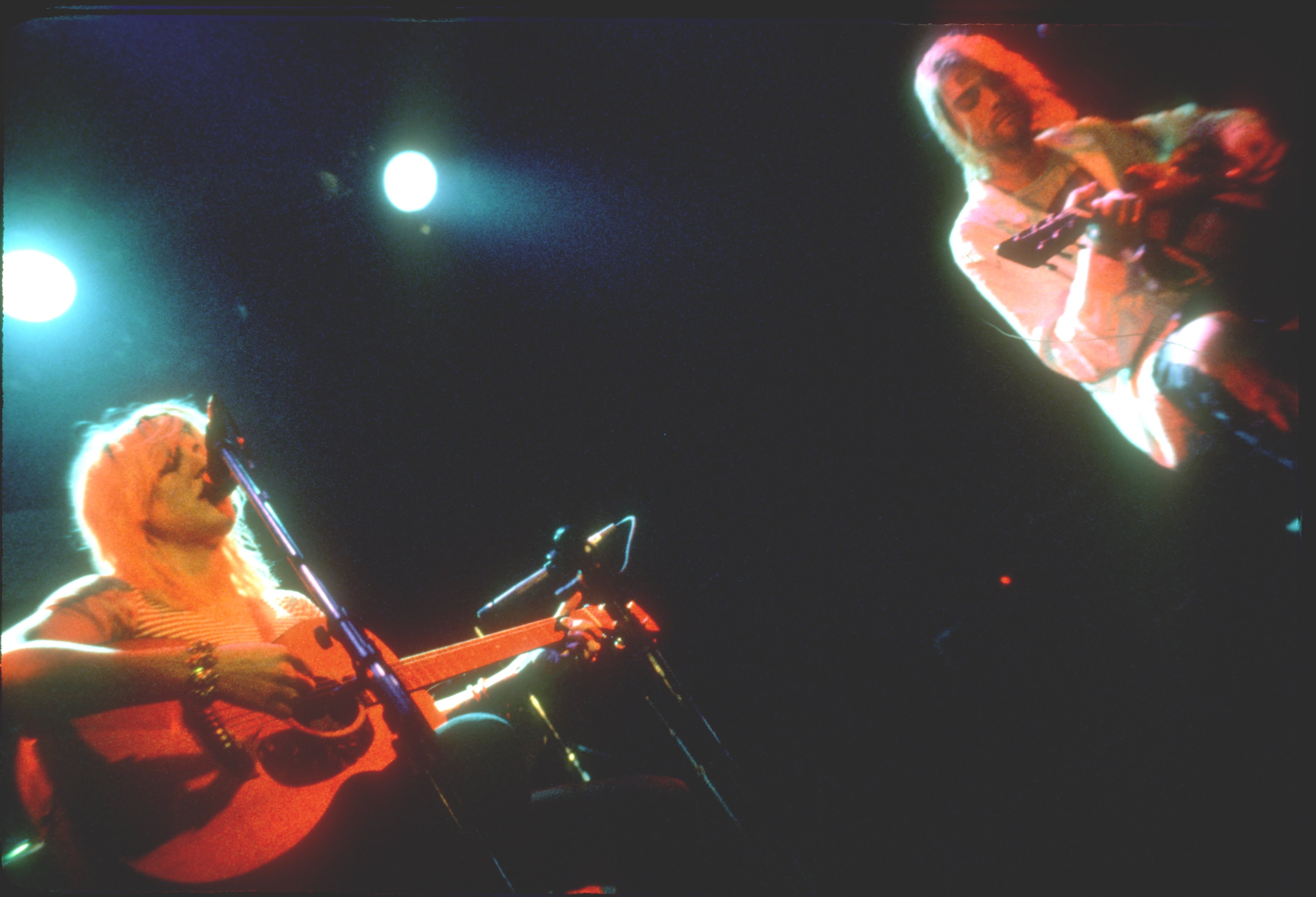 Courtney Love and Kurt Cobain, both on acoustic guitar, perform together for Rock Against Rape at Club Lingerie in Hollywood on September 8, 1993 in Los Angeles
