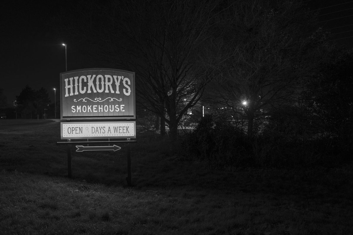 Leica Q3 Monochrom sample gallery: smokehouse sign, at night
