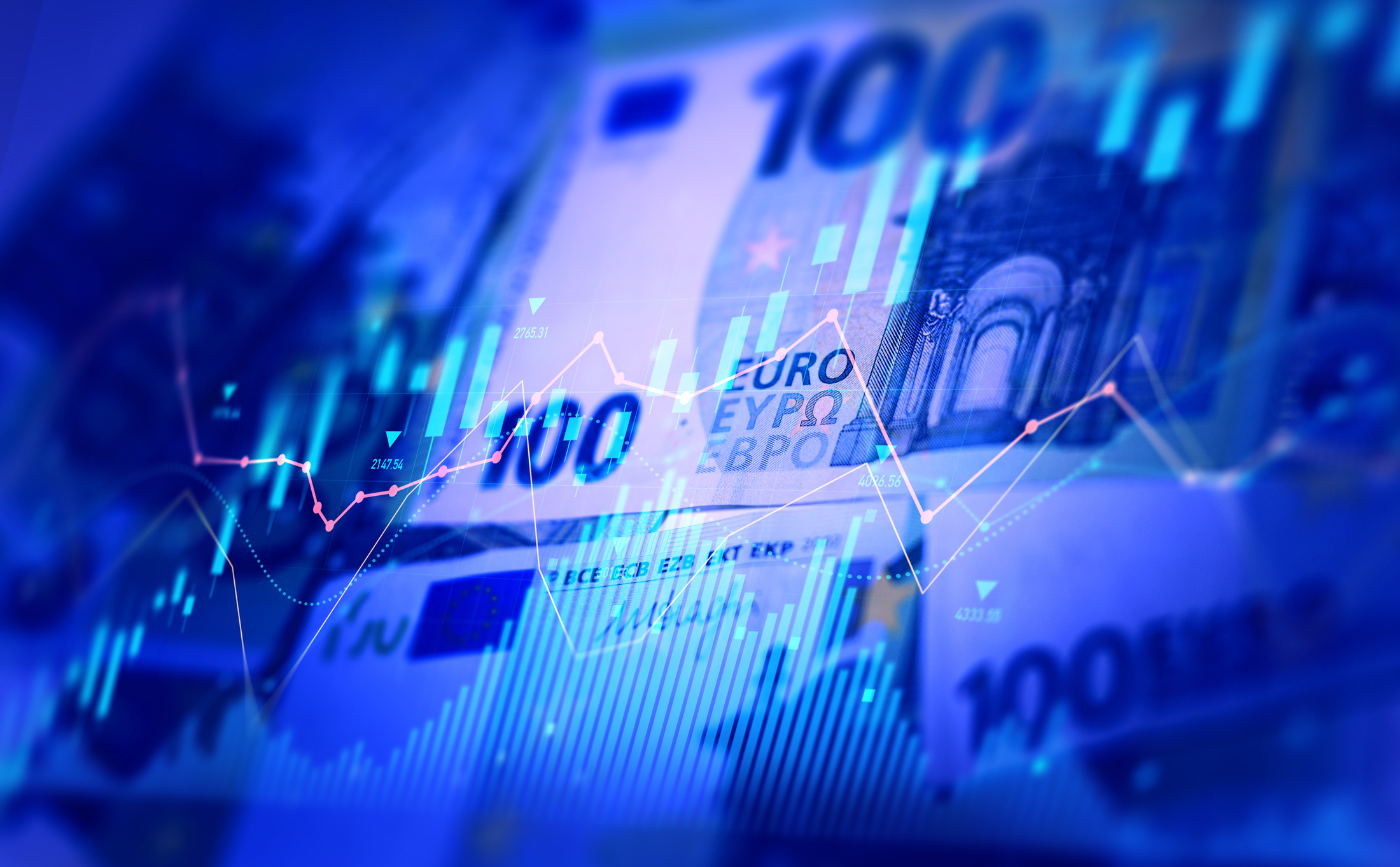 Euro banknotes with stock market chart