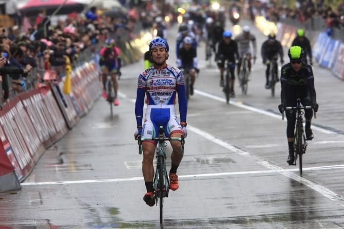 Fabio Felline (Androni Giocattoli) rolls across the finish line in Treviso after he and his breakaway companions were swept up in sight of the finish line, having been on the attack nearly the entire stage.
