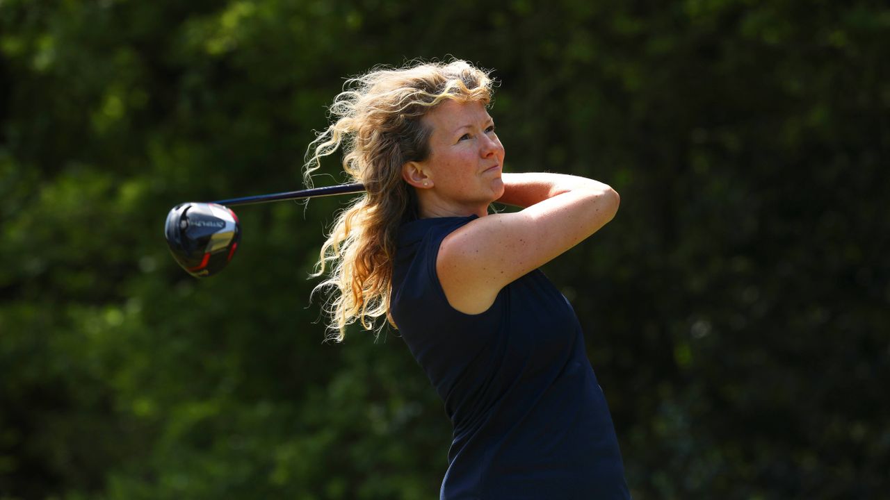 Katie Dawkins hitting a drive